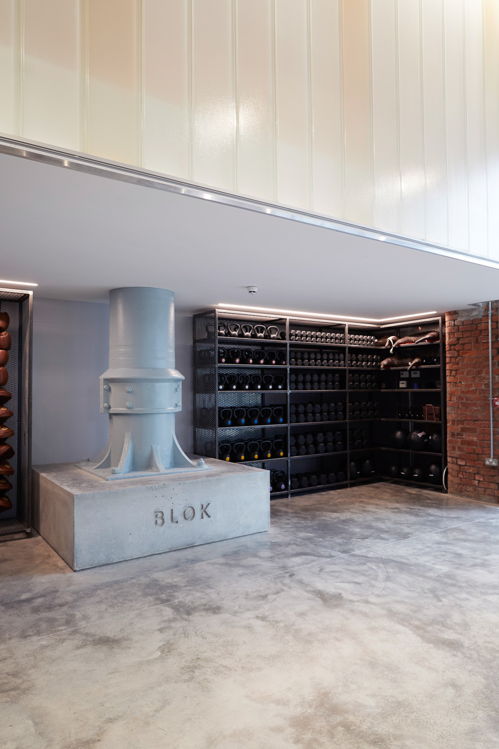 STUDIO 3, Concrete pillar moulds, mild steel shelving with media centre and access hatches.
