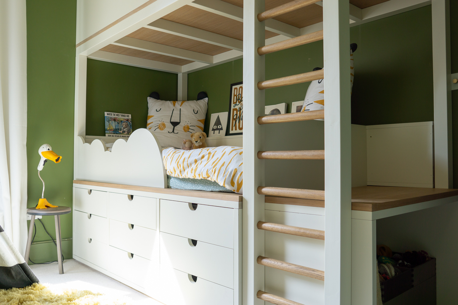 Bunk Bed, Based on a captains bed. Extra chunky timber frame. The lower cloud is removable so as to transform into daybed. Has desk / changing area.
