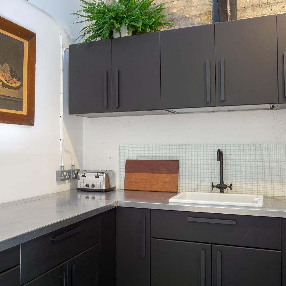 DOWNSTAIRS KITCHEN, Ikea cabinets with 3mm aluminium work surface.
