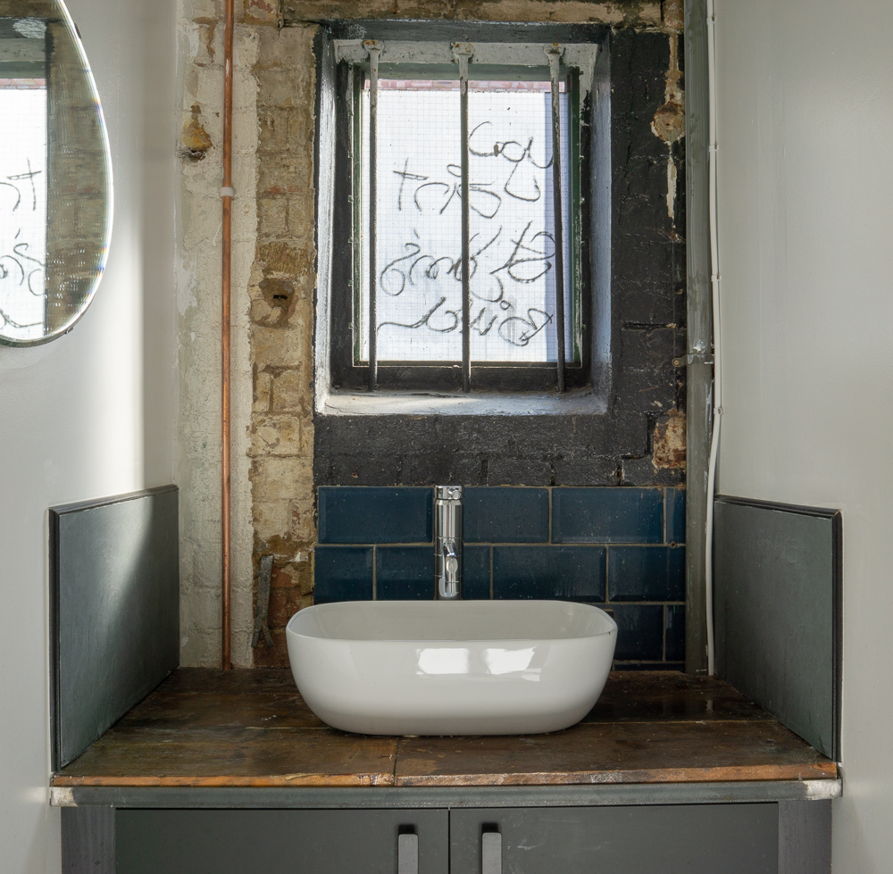 DOWNSTAIRS SINK, Hand washing sink and base.
