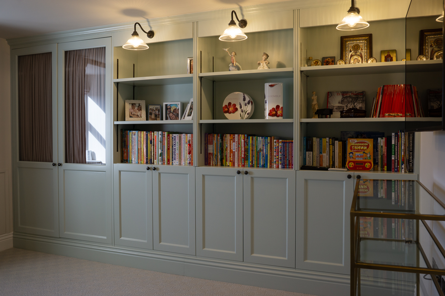 Wardrobe & shelving, Glass doored wardrobe with cabinets and shelves built around chimney breast.
