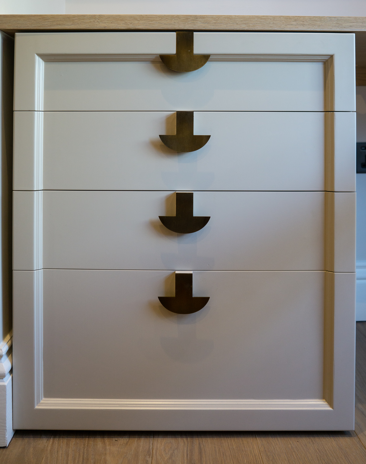 Under desk drawers, Made to match cabinet design with custom designed handles.
