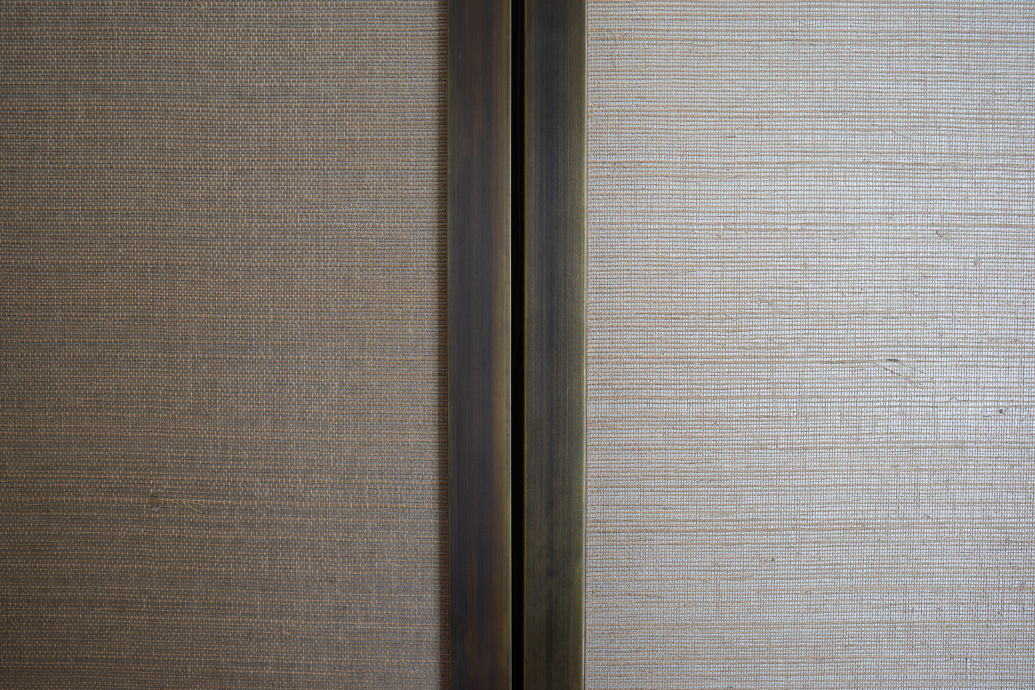Wardrobe Doors, Hand patinated antique Brass, Philip Jeffries Linen Wallpaper 
