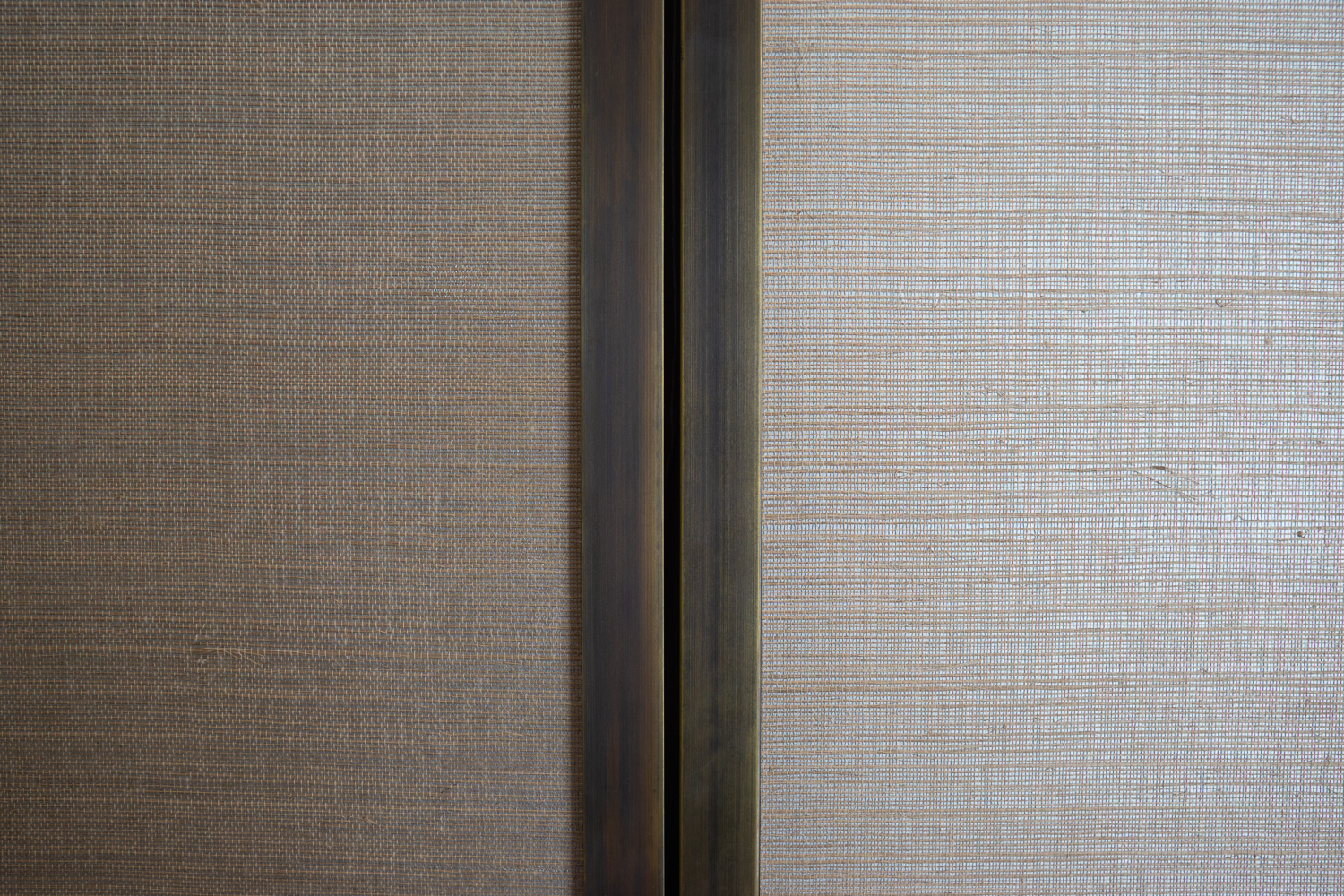 Wardrobe Doors, Hand patinated antique Brass, Philip Jeffries Linen Wallpaper 
