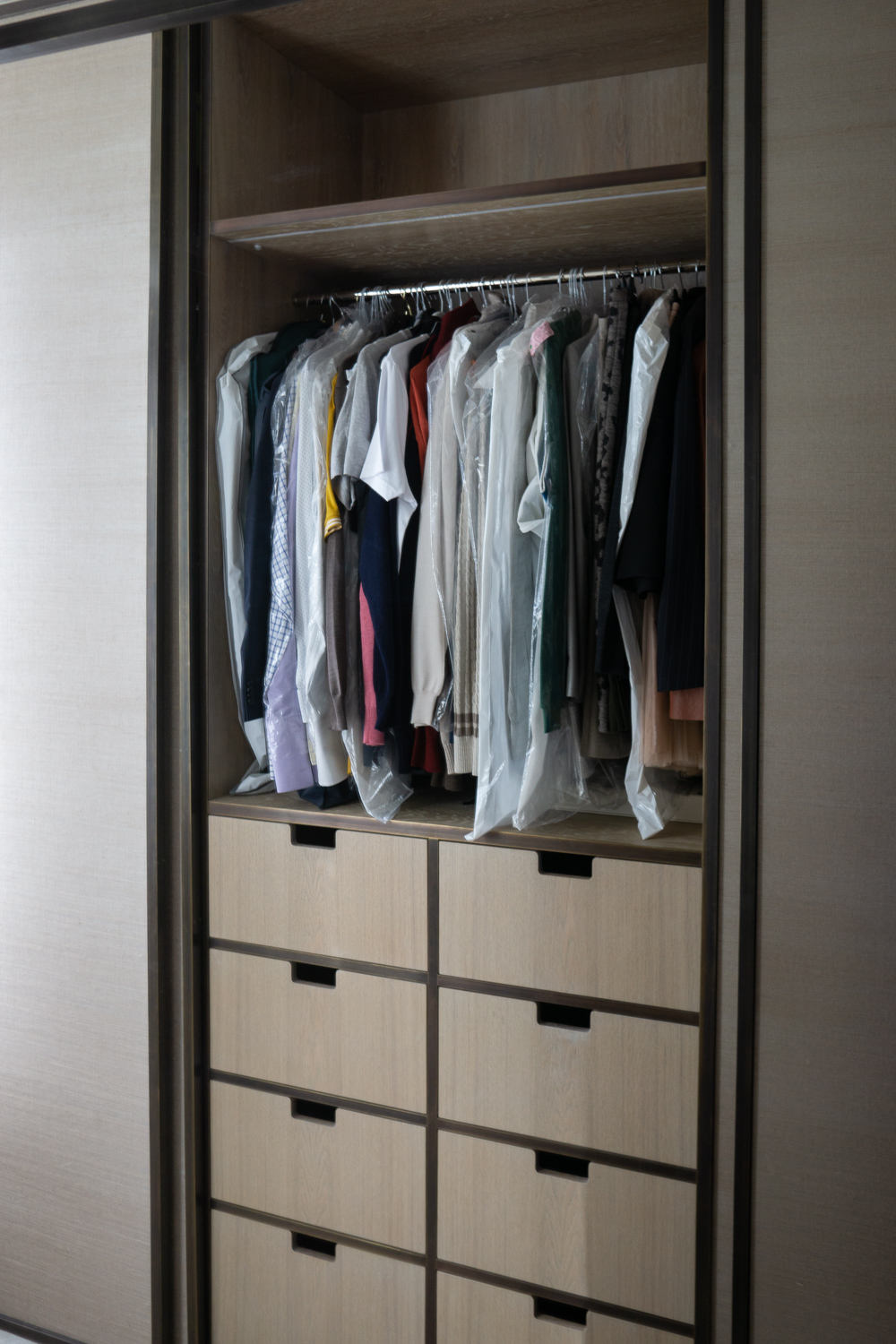 Main Wardrobe, Brass faced oak timber all hand patinated. Integrated motion sensing lighting.